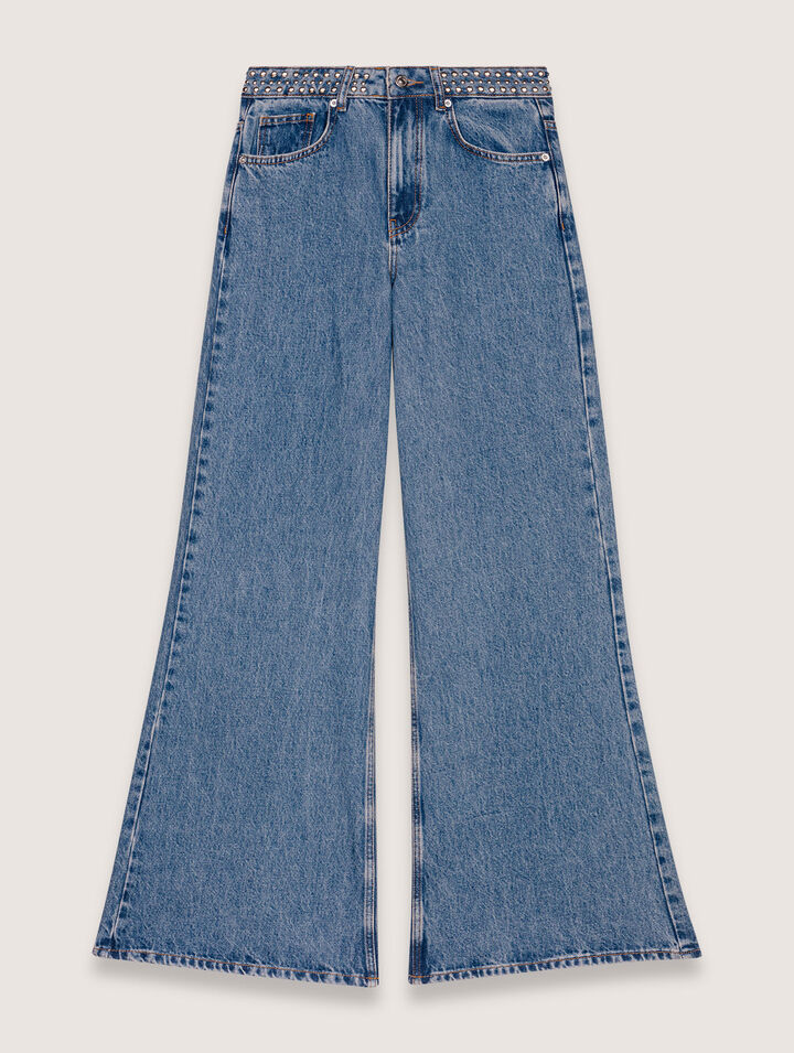 Jeans flare con vita borchiata