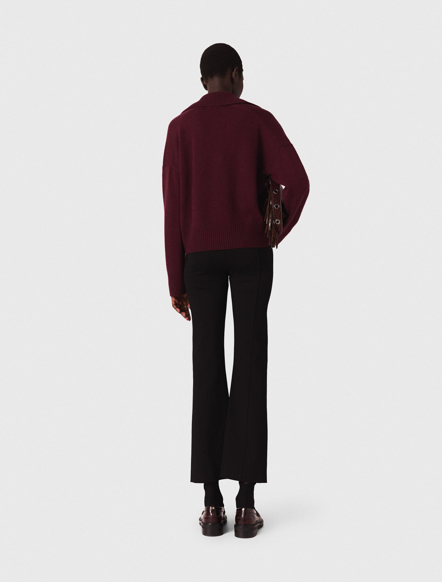 Pantaloni con spacco