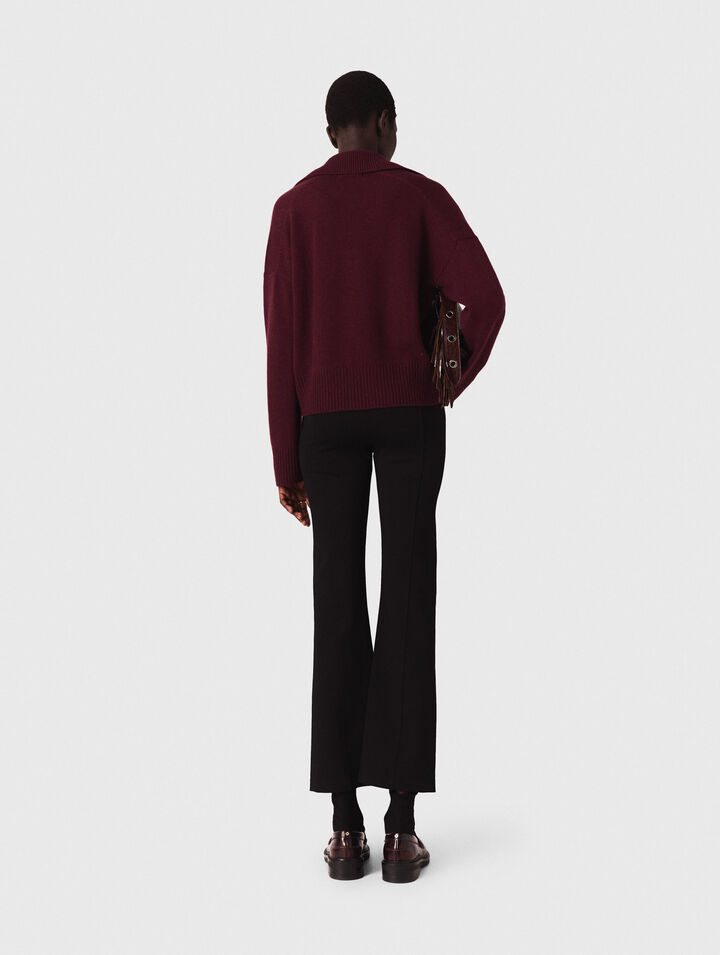 Pantaloni con spacco