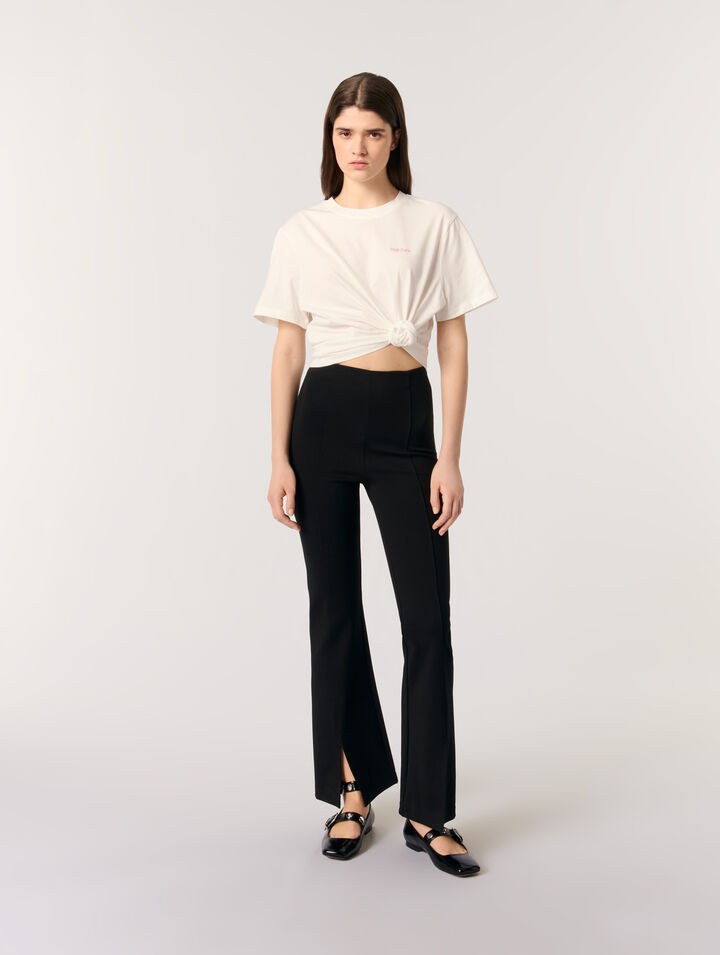 Pantaloni con spacco