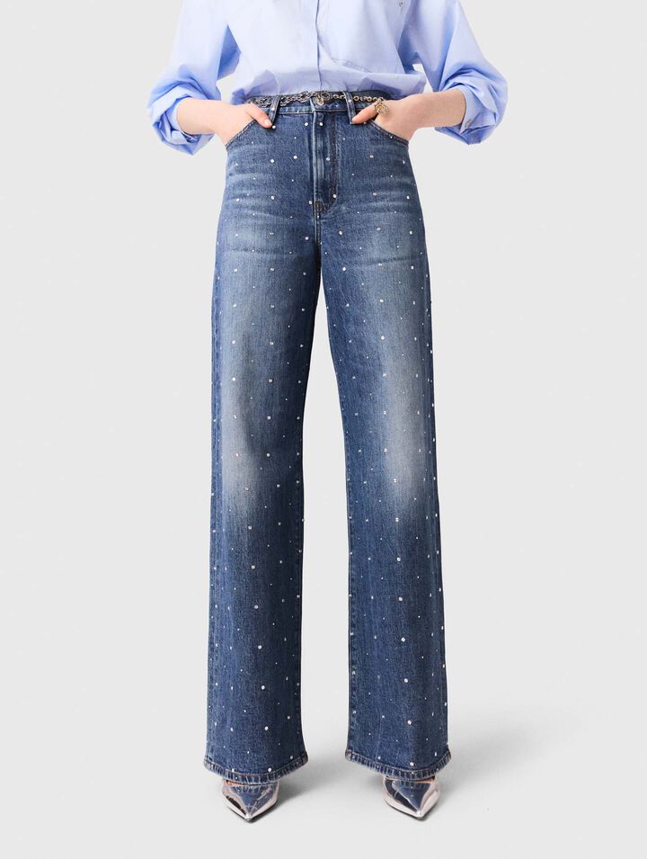 Jeans larghi in denim con borchie