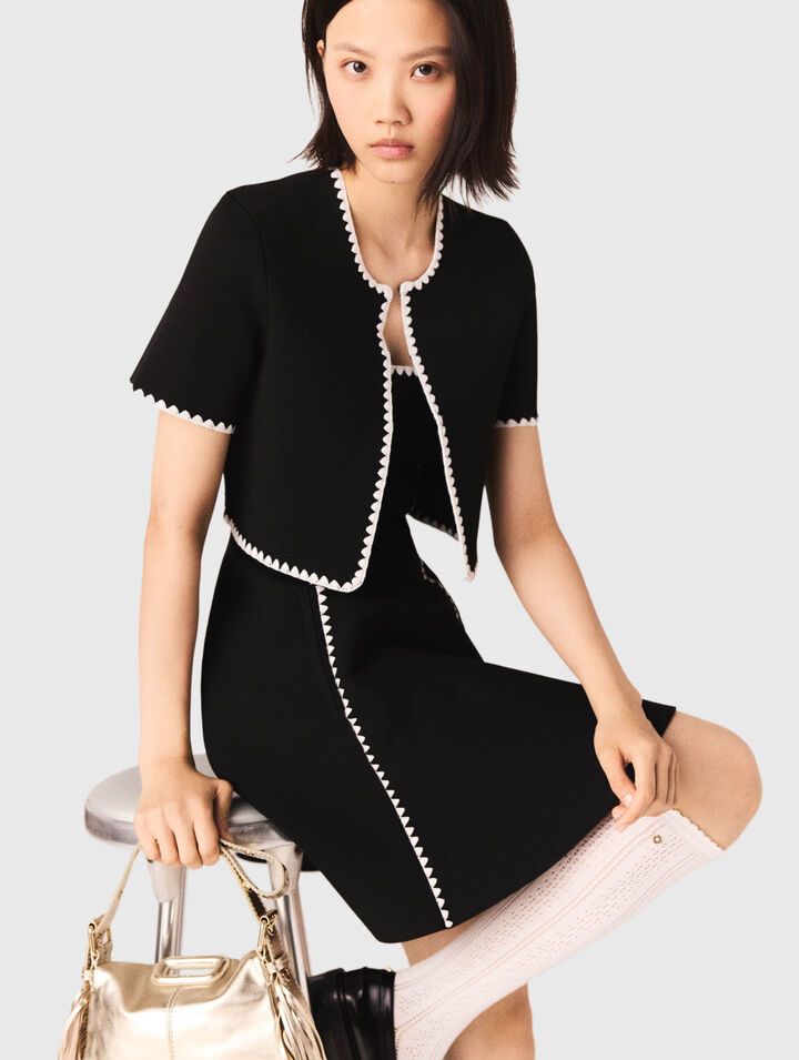 Cardigan corto con impunture