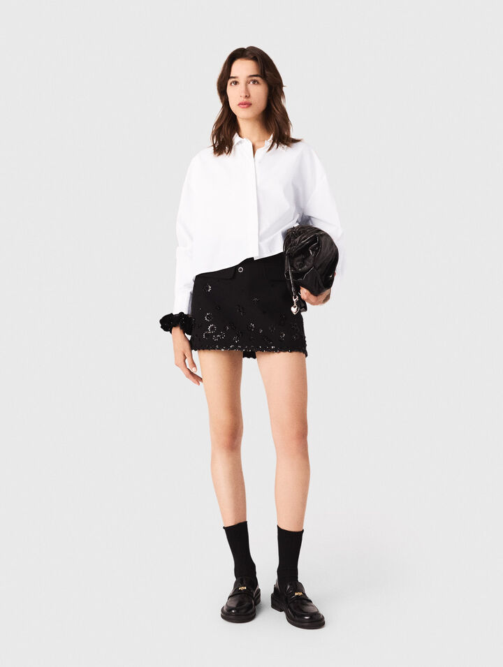 Shorts trompe l'œil ricamati