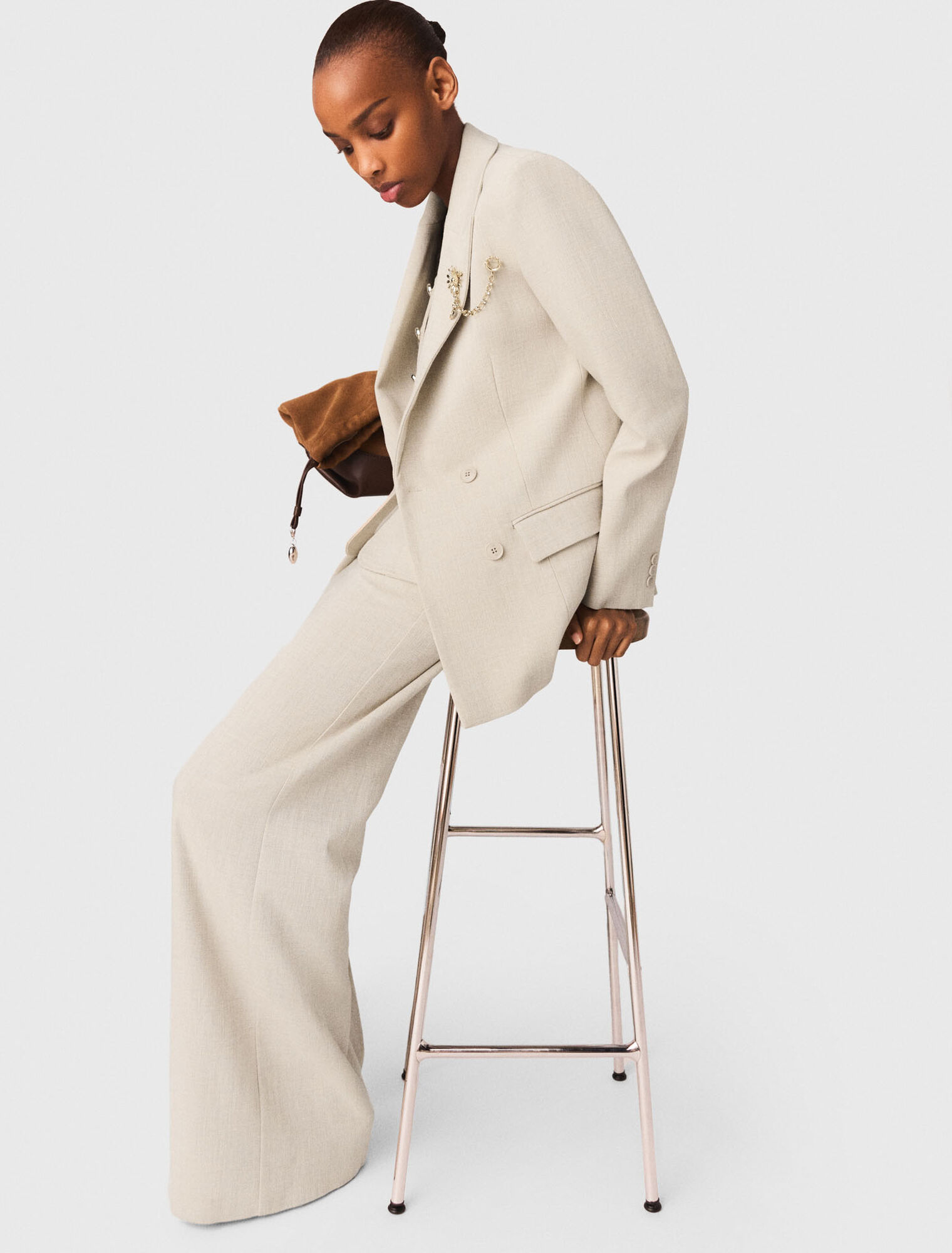 Giacca da tailleur con spilla