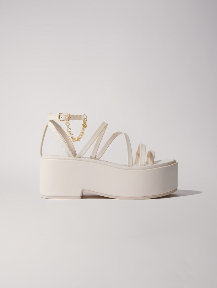 Sandali con zeppa in pelle