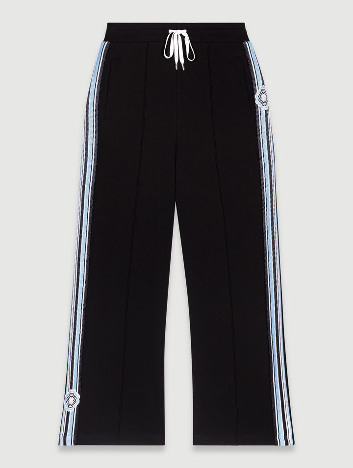 Pantaloni jogging larghi con bande