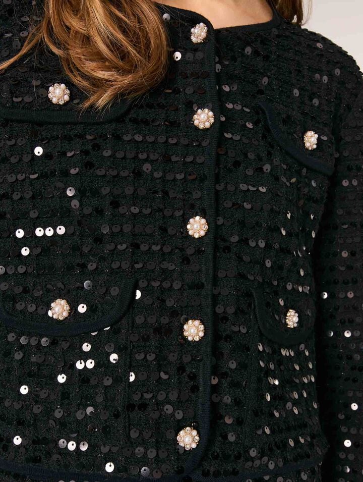 Cardigan corto con lustrini
