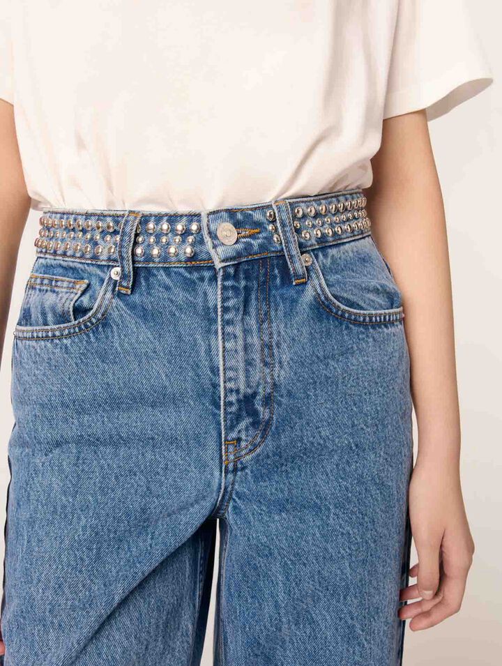 Jeans flare con vita borchiata