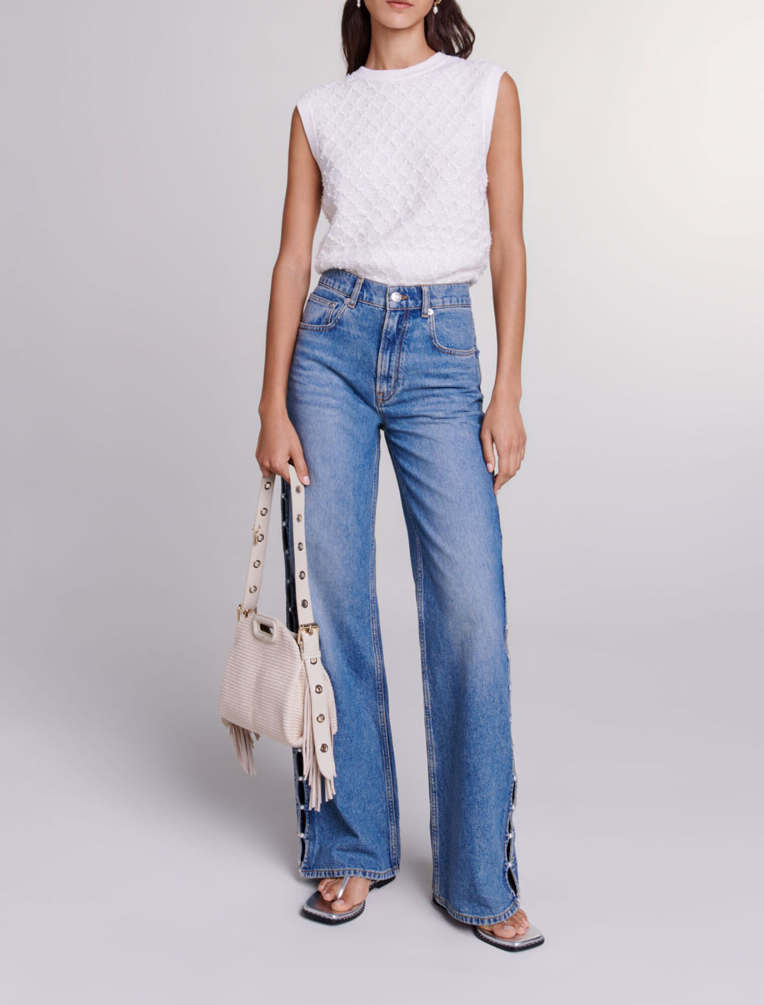 Jeans dritti traforati con perline