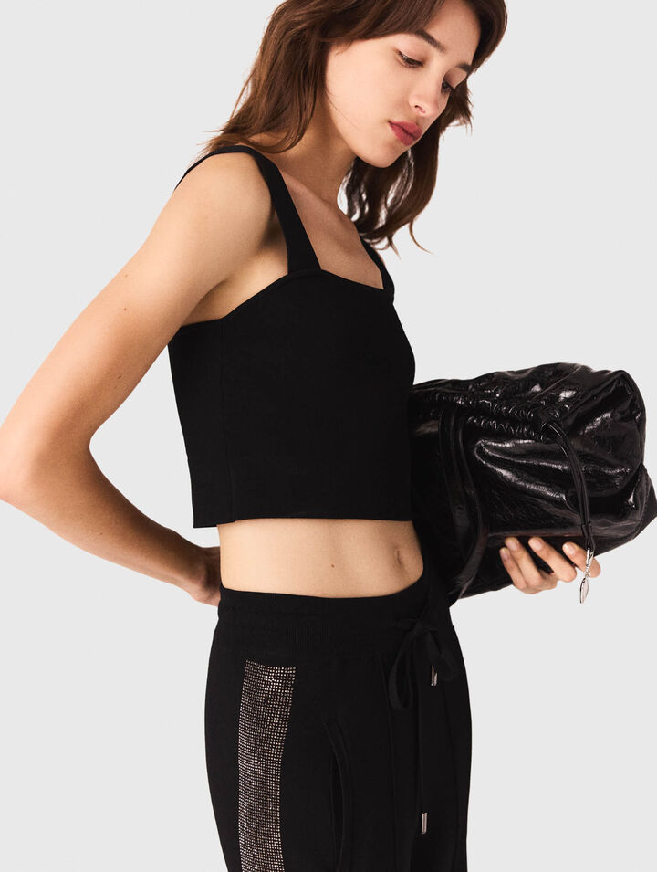 Top crop in maglia con spalline