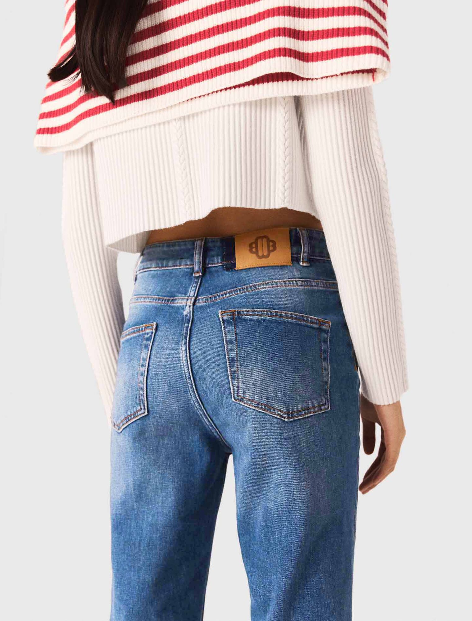 Jeans in denim con tasche