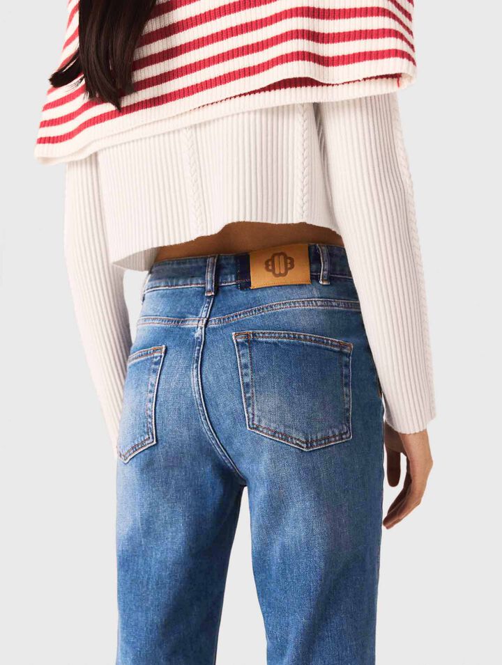 Jeans in denim con tasche