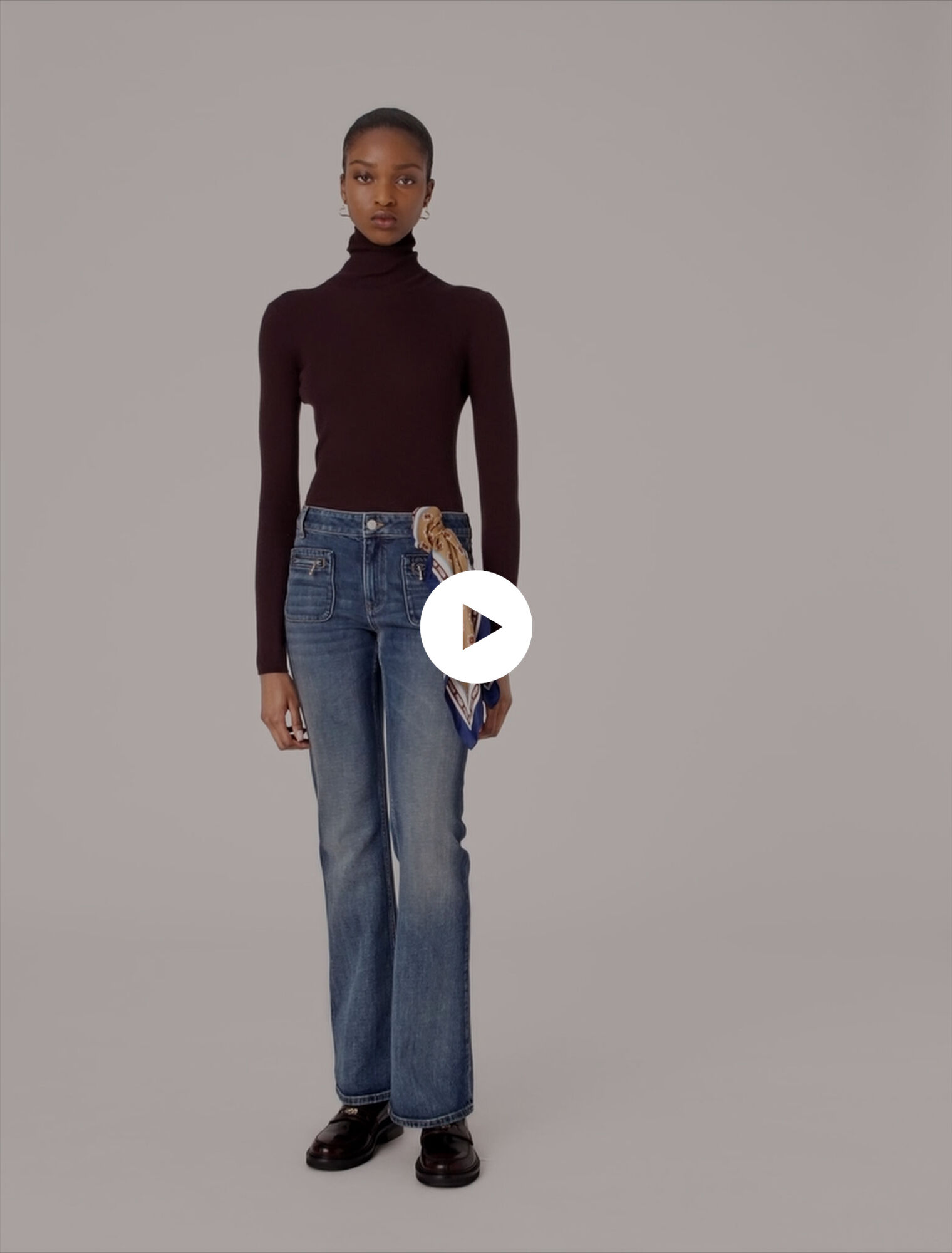 Jeans bootcut con tasche con zip