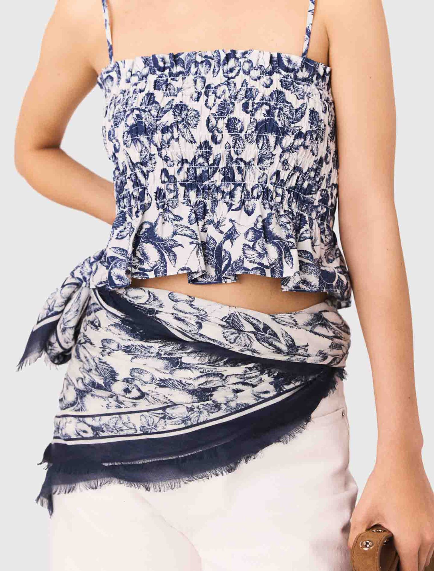 Top a punto smock stampato