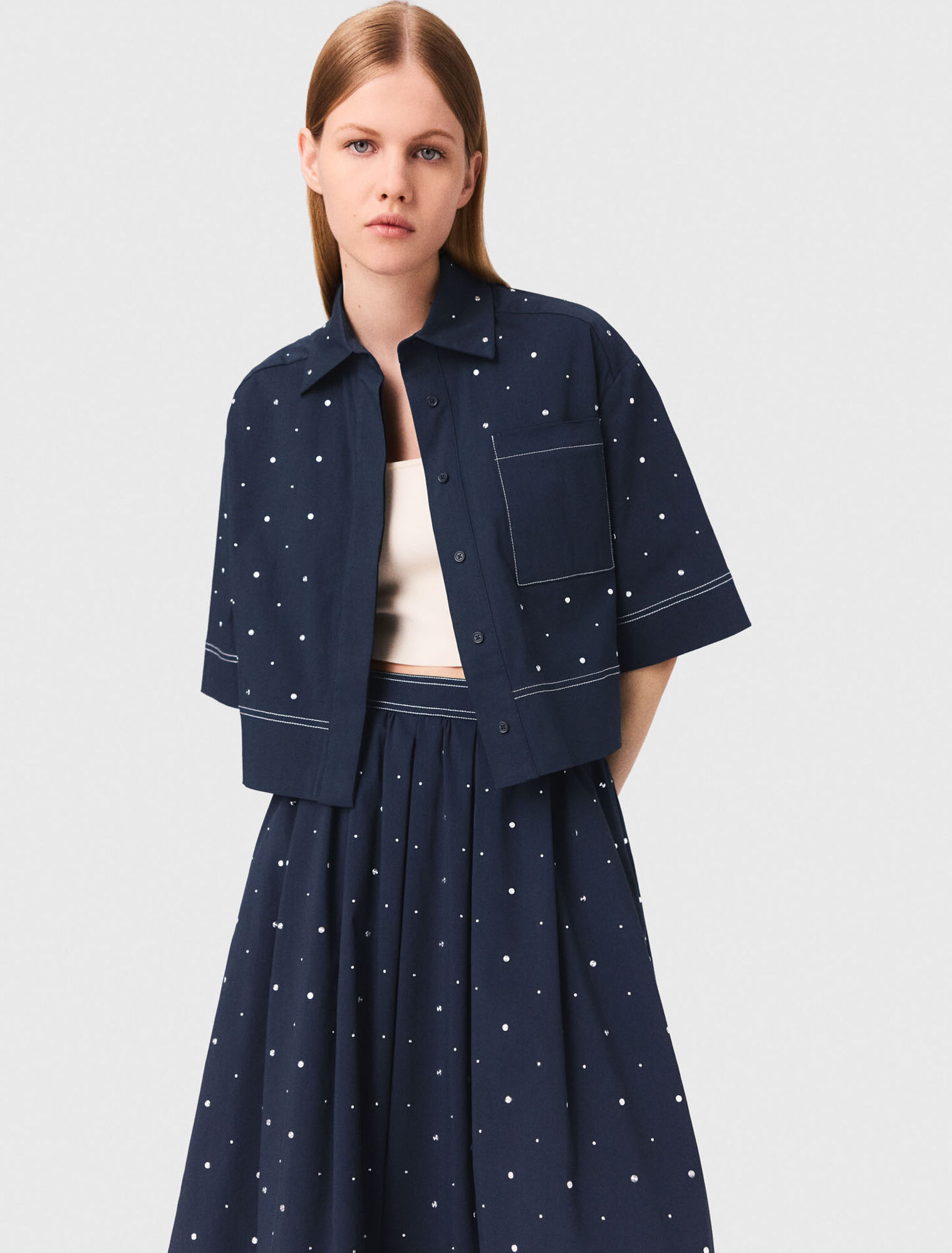 Camicia cropped con borchie