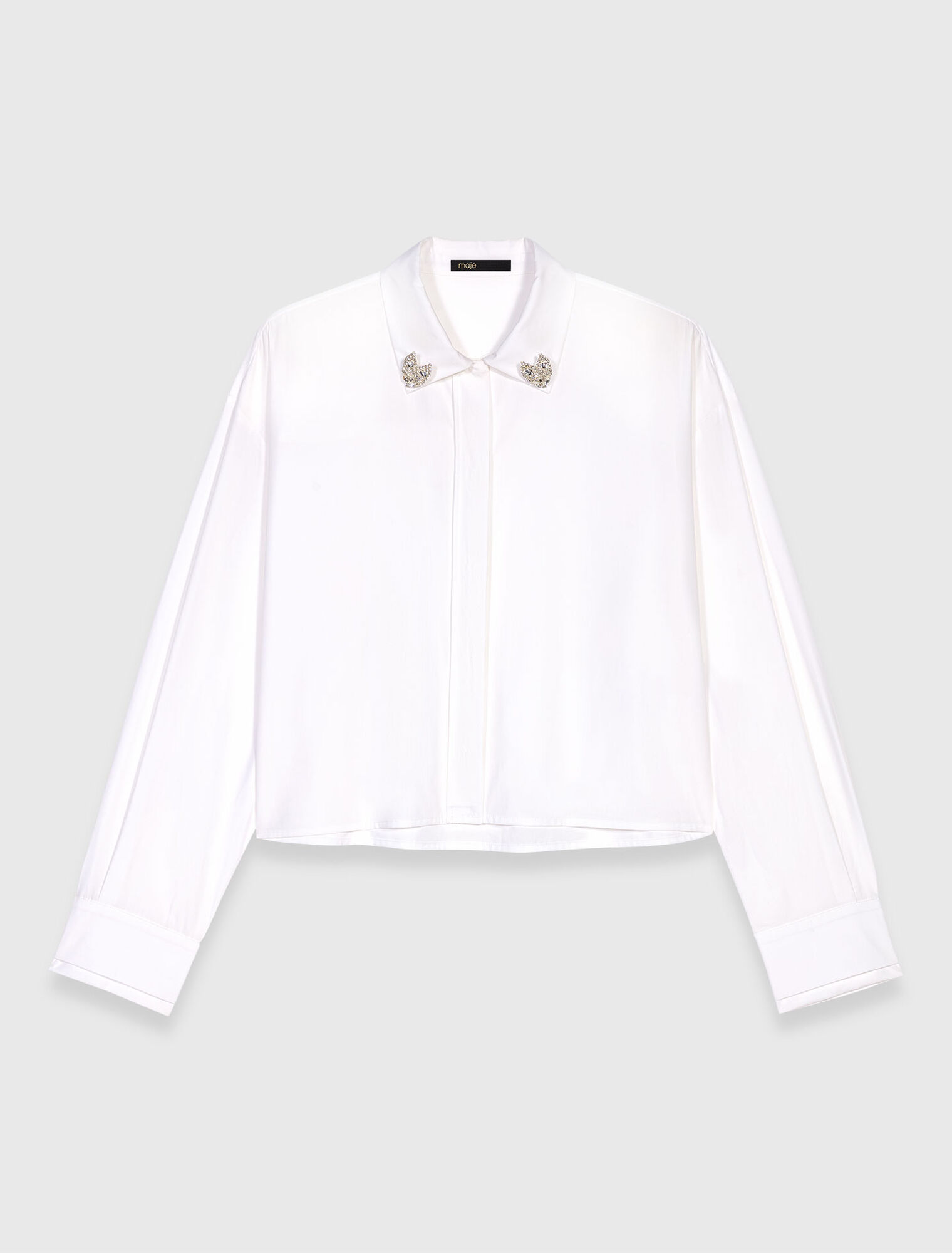Camicia corta con dettagli gioiello