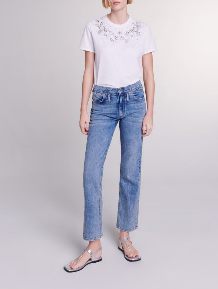 Jeans con dettagli intrecciati