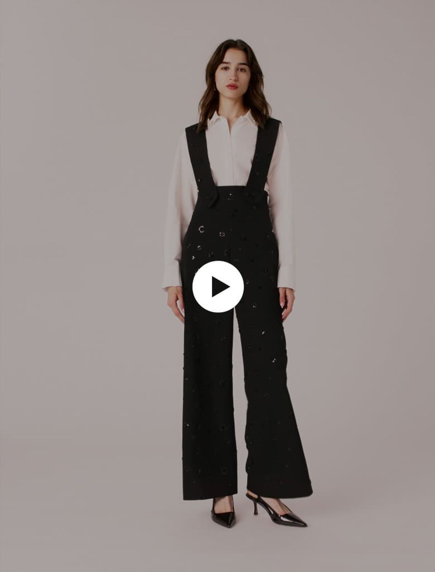 Pantaloni ricamati con bretelle