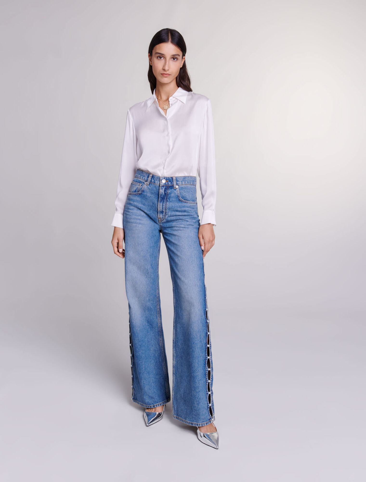 Jeans dritti traforati con perline