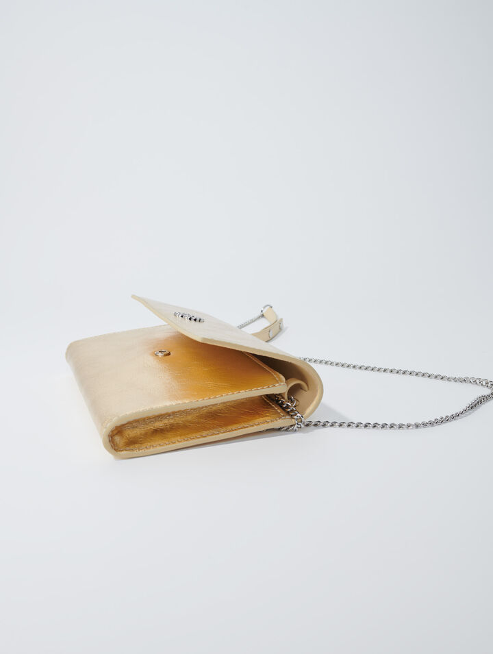 Pochette con catena in pelle