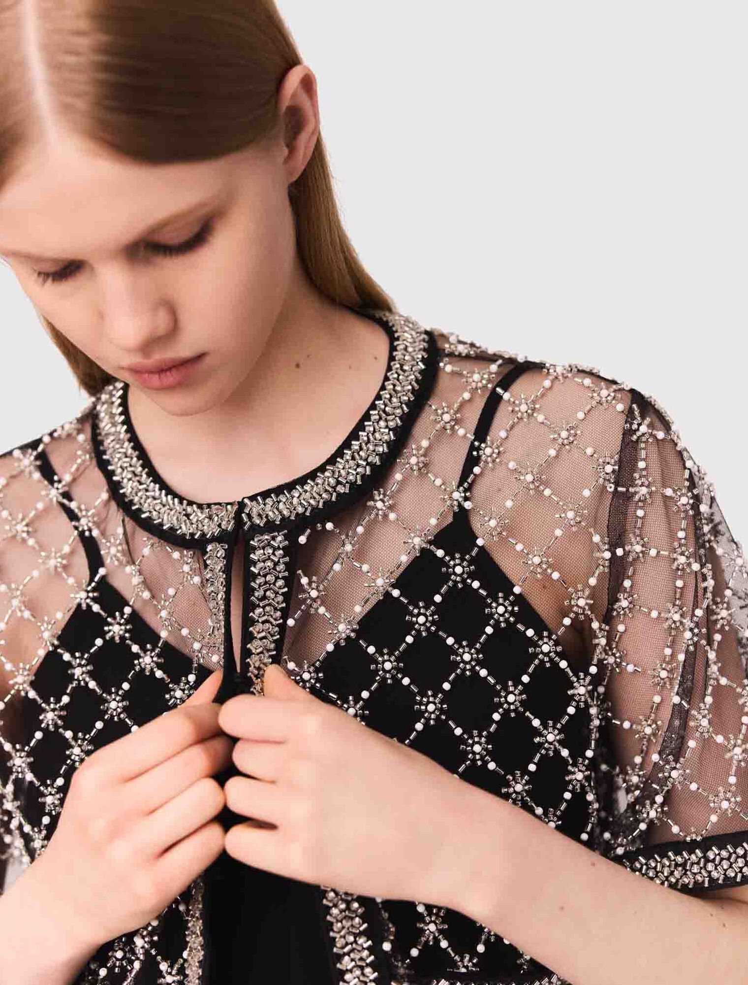 Top in tulle ricamato