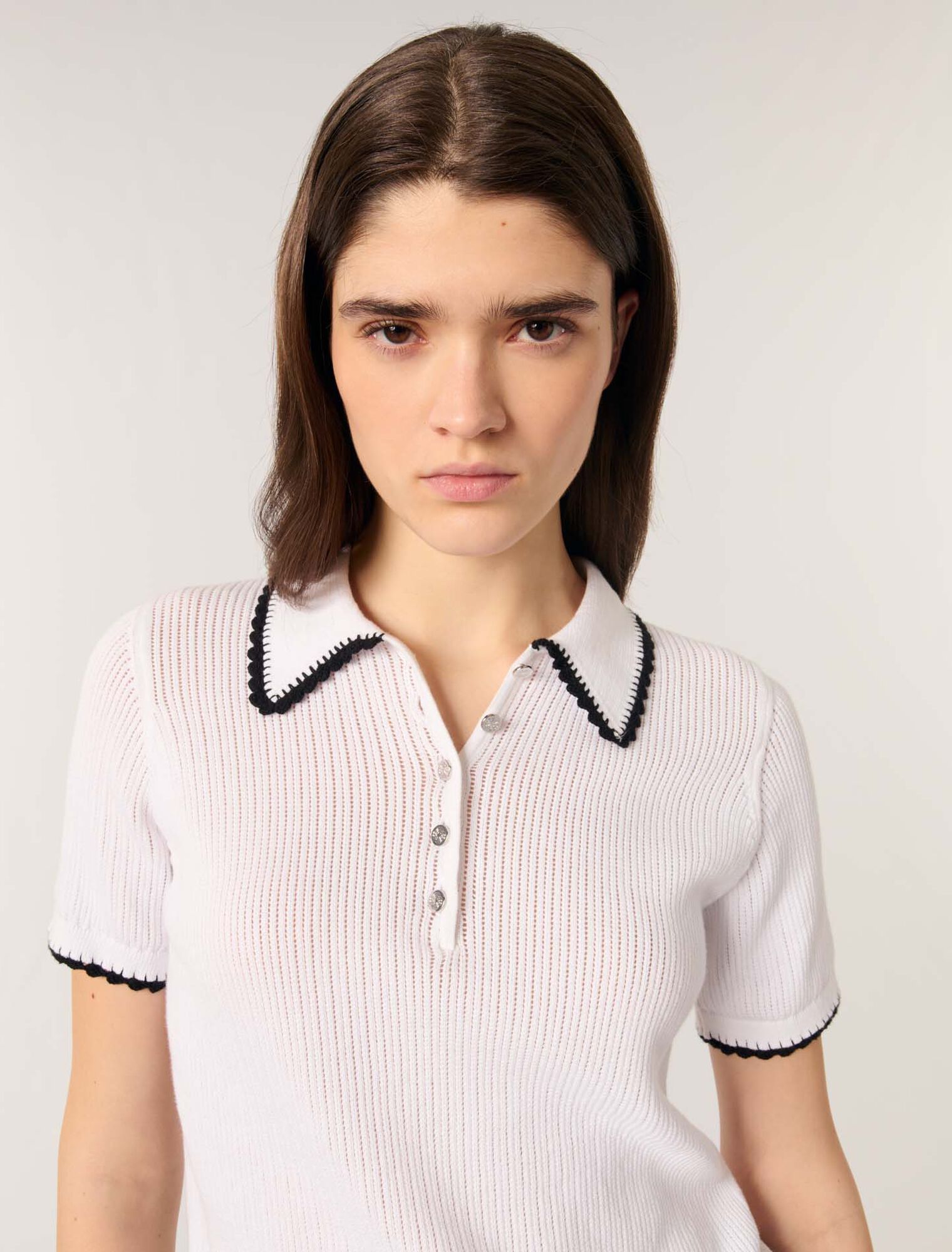 Polo in maglia pointelle e crochet