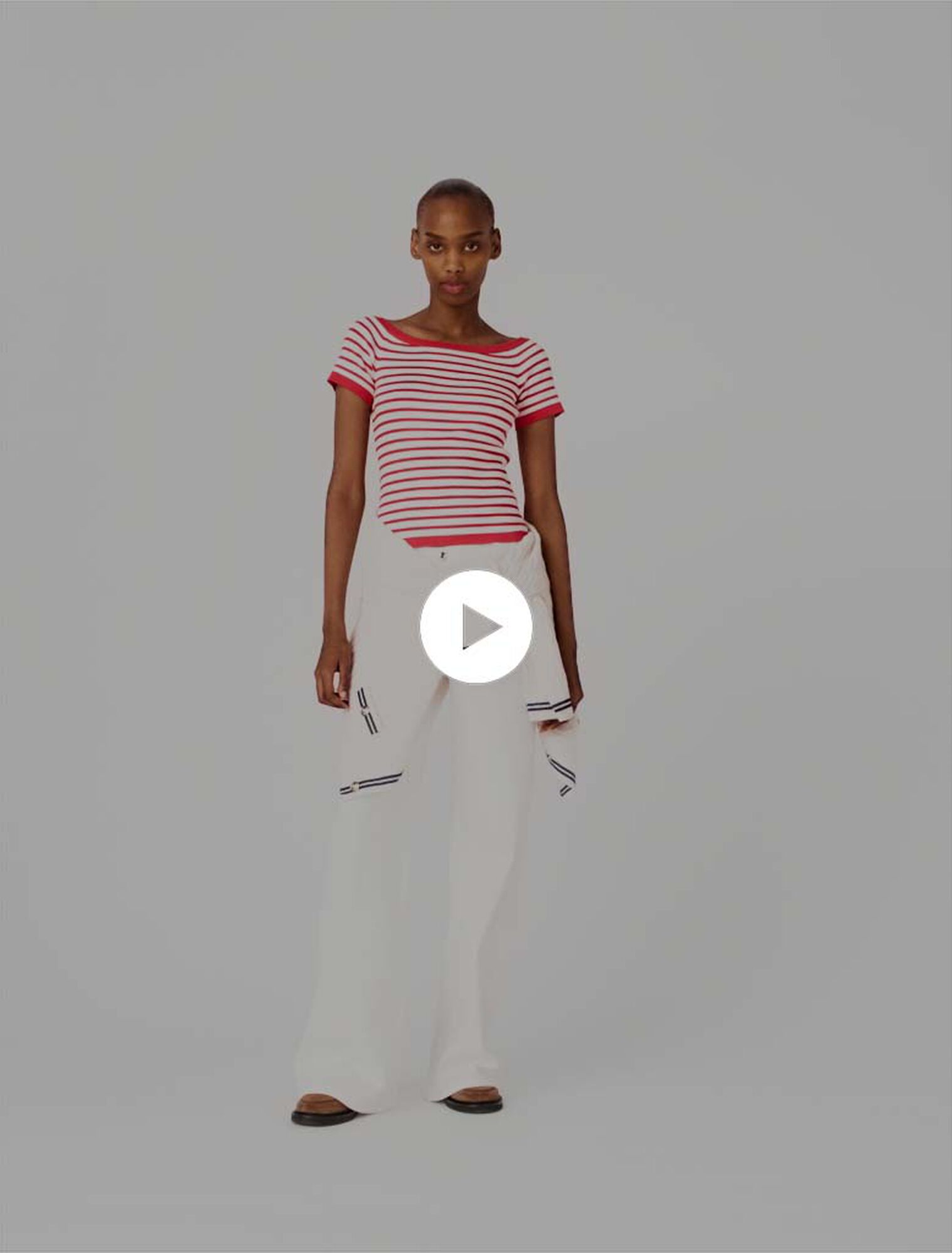 Top maglia a righe scollo a barca