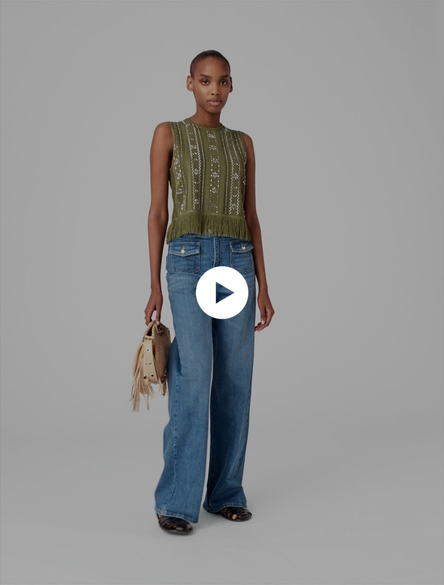 Top con fiori di strass e frange